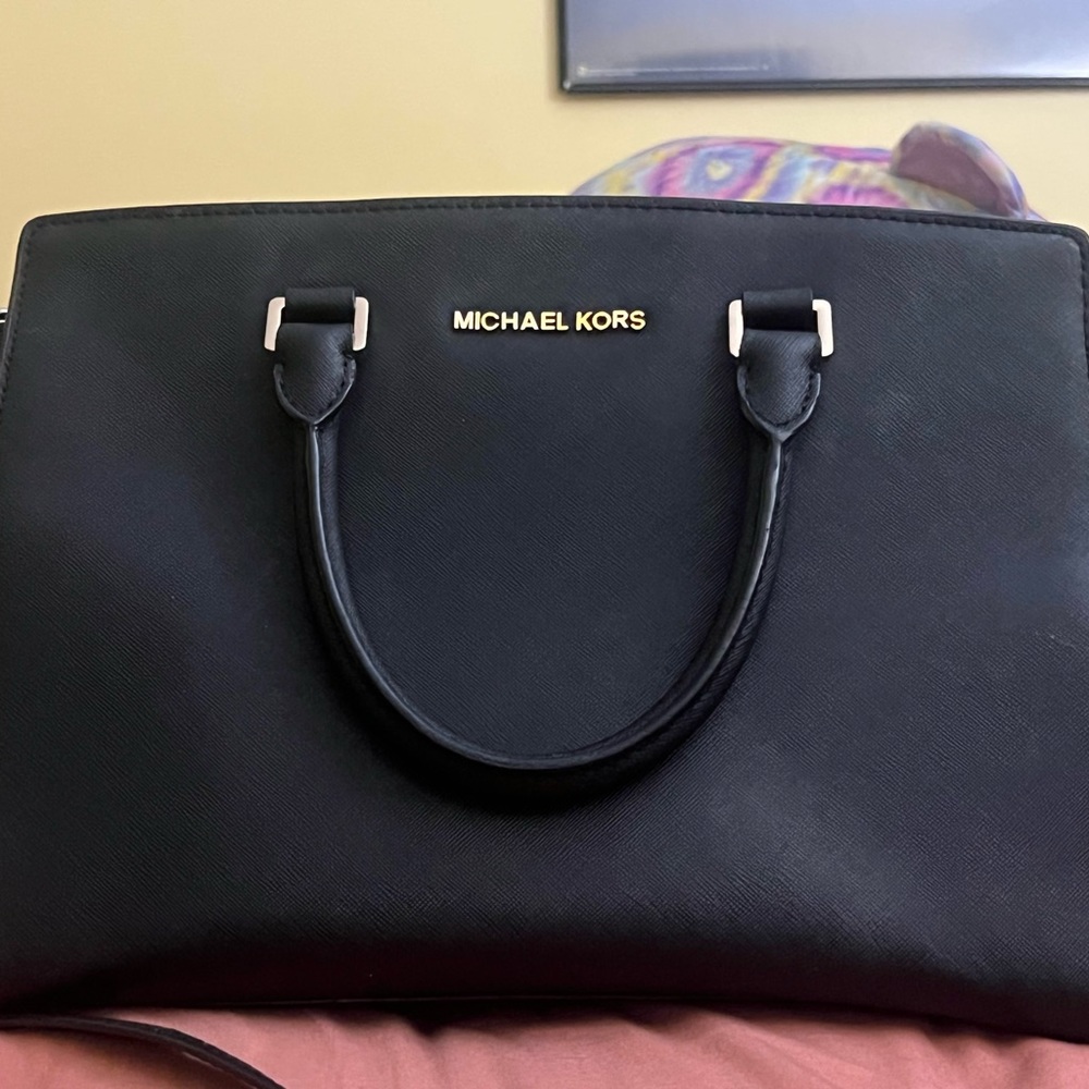 This is a black Michael korse bag
